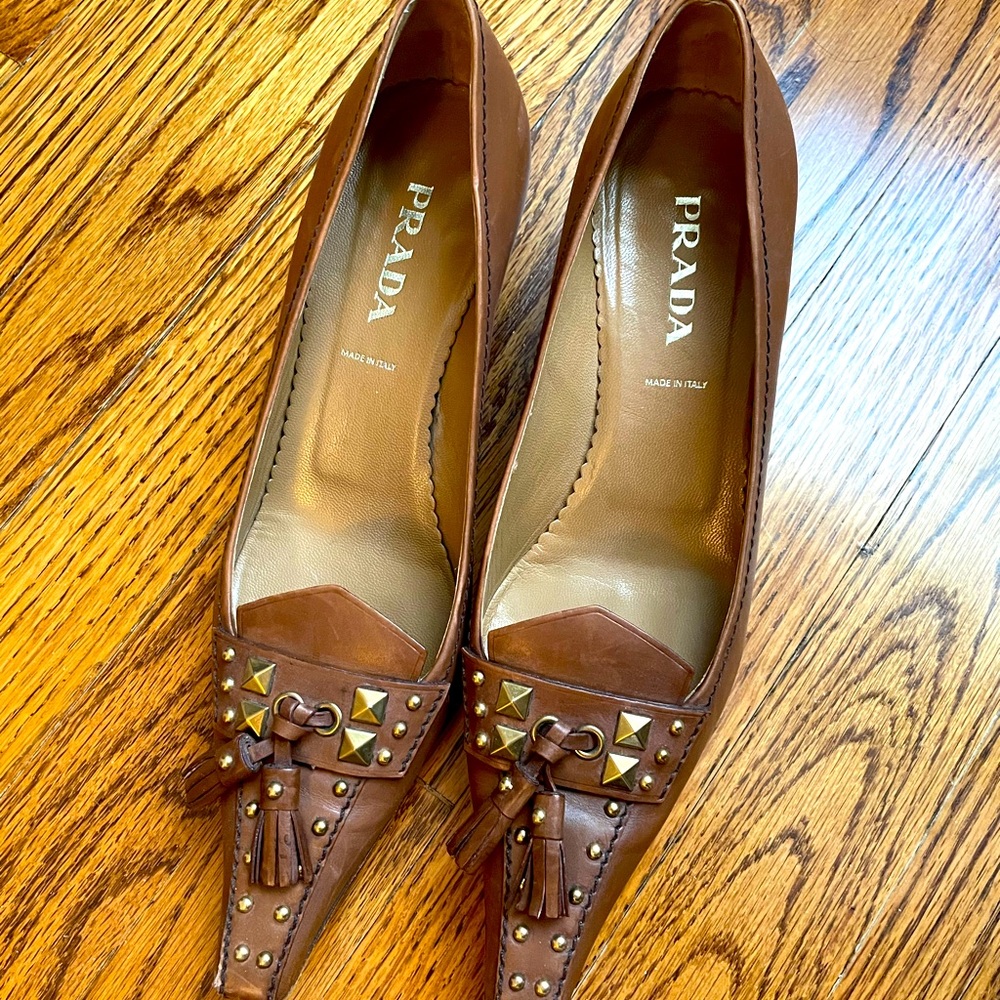 kitten heel PRADAs with unique metal detail.